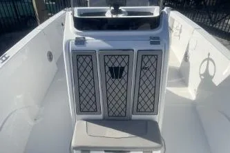 Slide: The Image of 2022 Wellcraft 202 Fisherman boat interior with seating and console design. - 9