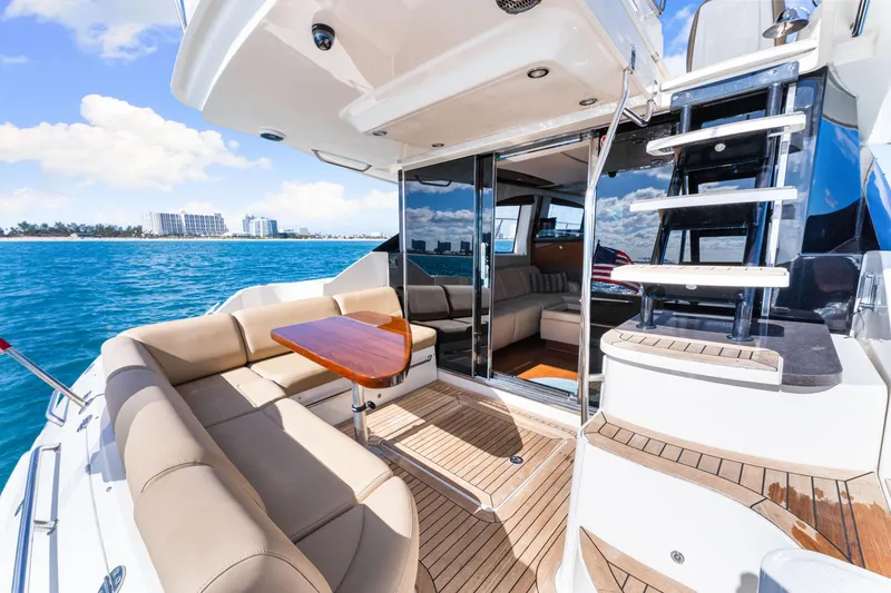 Slide: The Image of Luxurious 2016 Sea Ray 510 Fly yacht with spacious deck and elegant interior. - 14