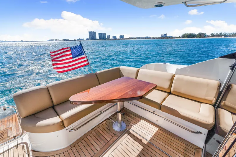 Slide: The Image of Luxurious 2016 Sea Ray 510 Fly yacht with elegant seating and ocean view. - 15