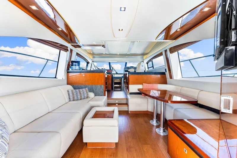 Slide: The Image of Luxurious interior of 2016 Sea Ray 510 Fly yacht with elegant seating and wooden accents. - 19