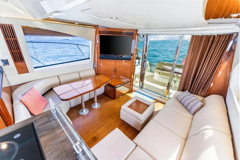 Slide: The Image of Luxurious interior of 2016 Sea Ray 510 Fly yacht with ocean view. - 25