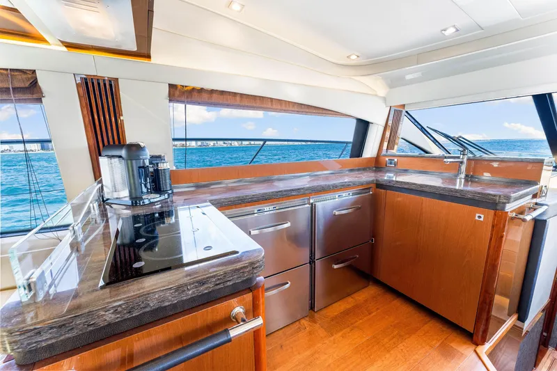 Slide: The Image of Luxurious kitchen interior of 2016 Sea Ray 510 Fly yacht with ocean view. - 27
