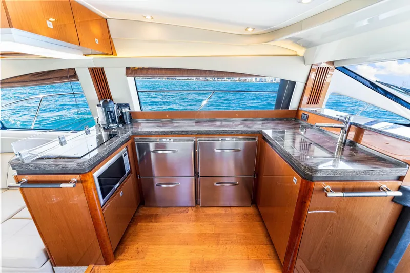 Slide: The Image of Luxurious kitchen interior of 2016 Sea Ray 510 Fly yacht with modern appliances. - 30