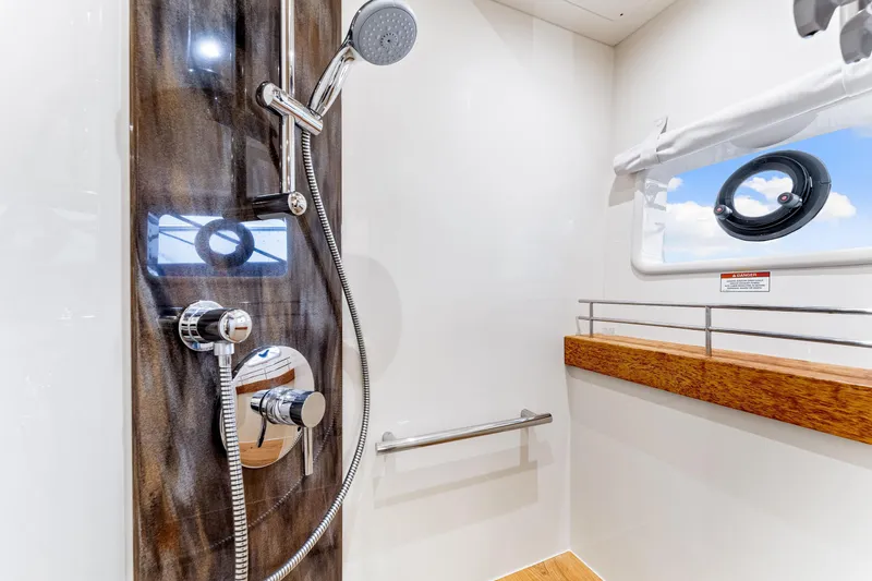 Slide: The Image of Luxurious shower area in 2016 Sea Ray 510 Fly yacht with modern fixtures. - 38