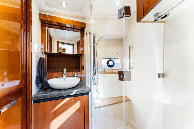 Slide: The Image of Luxurious bathroom interior of 2016 Sea Ray 510 Fly yacht with modern fixtures. - 41