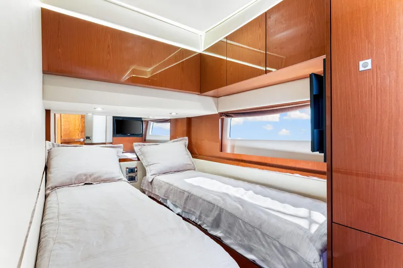Slide: The Image of Luxurious cabin interior of 2016 Sea Ray 510 Fly yacht with twin beds. - 42