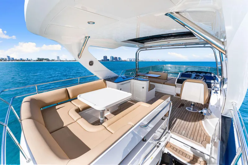 Slide: The Image of Luxurious 2016 Sea Ray 510 Fly yacht with spacious deck and ocean view. - 44