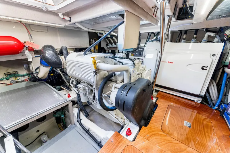 Slide: The Image of Engine room of 2016 Sea Ray 510 Fly yacht with Cummins Onan generator. - 63