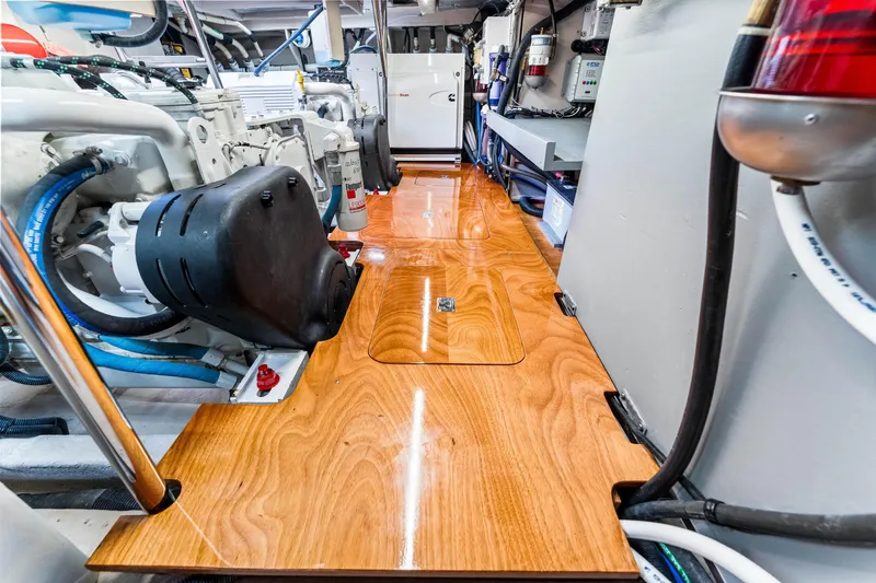 Slide: The Image of Engine room of 2016 Sea Ray 510 Fly yacht with polished wooden flooring. - 67