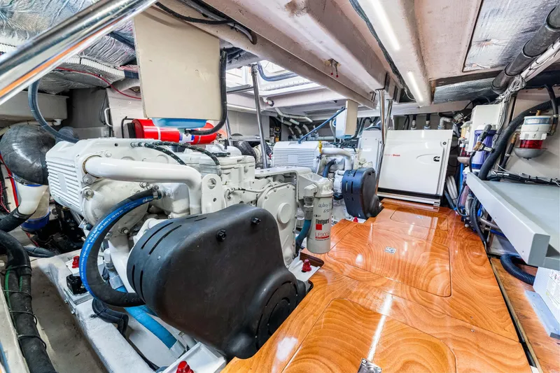 Slide: The Image of Engine room of 2016 Sea Ray 510 Fly yacht, showcasing machinery and equipment. - 68