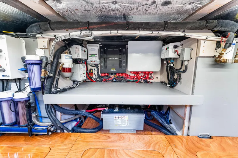 Slide: The Image of Engine room of 2016 Sea Ray 510 Fly yacht, showcasing electrical systems and components. - 70