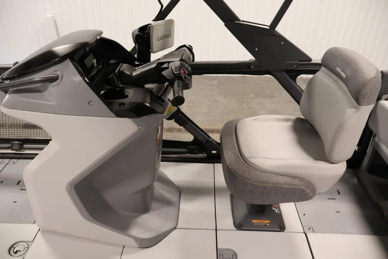 Slide: The Image of 2024 Sea-Doo Switch Cruise 18 helm with Garmin navigation and comfortable seating. - 11