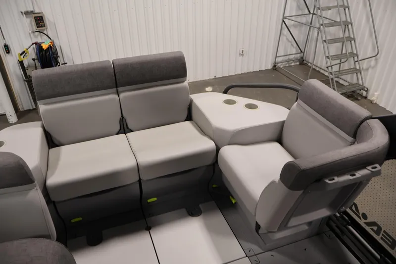 Slide: The Image of Open storage compartment of 2024 Sea-Doo Switch Cruise 18, showcasing interior design. - 21
