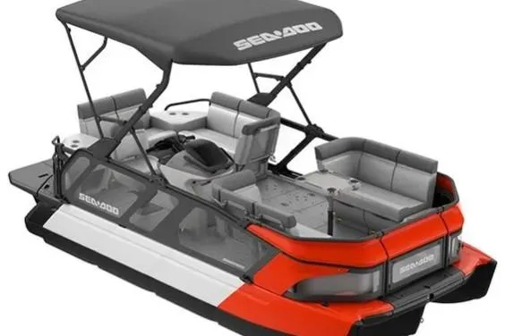 Slide: The Image of 2024 Sea-Doo Switch Cruise 18 pontoon boat with canopy and seating, side view. - 23
