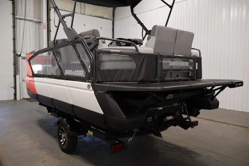 Slide: The Image of 2024 Sea-Doo Switch Cruise 18 dashboard with Garmin navigation system, showcasing modern controls. - 6