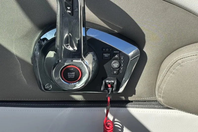 Slide: The Image of Throttle control panel of 2026 Crownline Eclipse E260 XS boat. - 11
