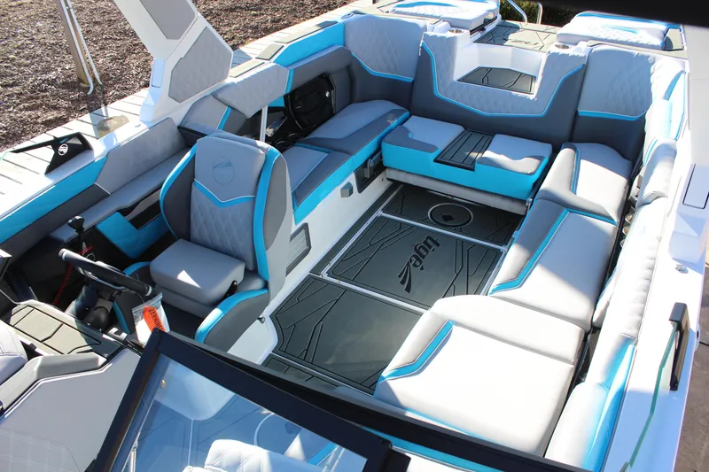 Slide: The Image of 2026 Tigé 24RZX boat interior with modern seating and sleek design. - 11