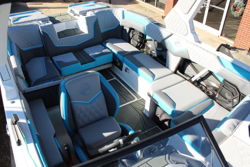 Slide: The Image of 2026 Tigé 24RZX boat interior with modern seating and sleek design. - 12