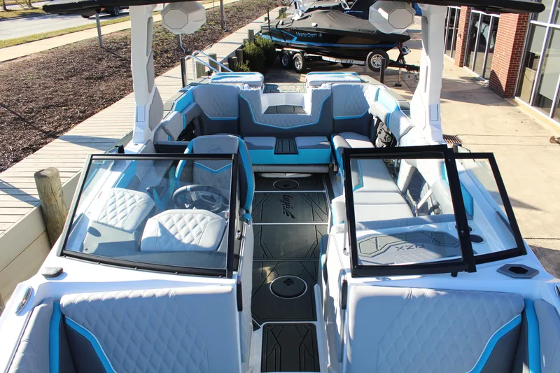 Slide: The Image of 2026 Tigé 24RZX boat interior with modern seating and sleek design. - 13