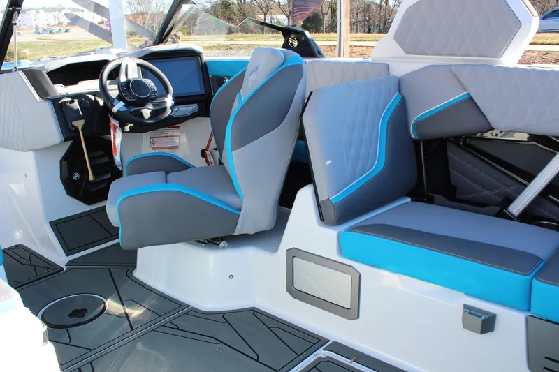 Slide: The Image of 2026 Tigé 24RZX boat interior with modern steering and stylish seating. - 20