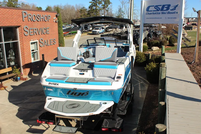 Slide: The Image of 2026 Tigé 24RZX boat at Charlotte Ski Boats dealership, showcasing sleek design and modern features. - 4