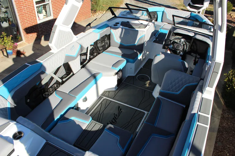 Slide: The Image of 2026 Tigé 24RZX boat interior with modern seating and sleek design. - 9