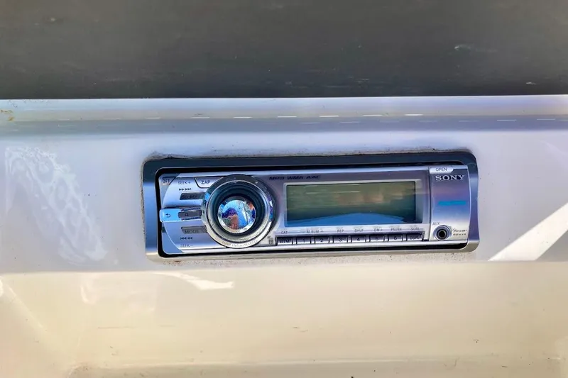 Slide: The Image of Sony stereo system on 2017 Sea Ray 19 SPX OB boat dashboard. - 28
