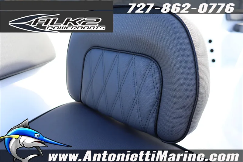 Slide: The Image of 2026 ALK2 Powerboats 18 CRS Center Console seat detail with logo and contact information. - 11