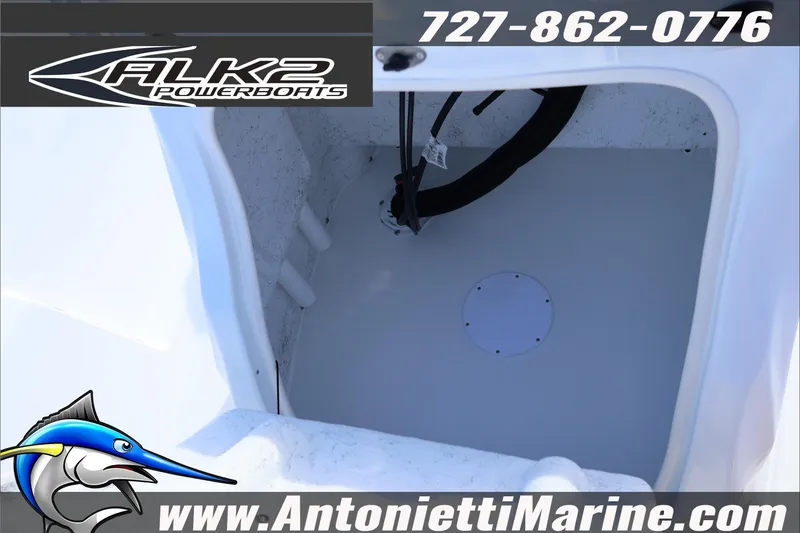 Slide: The Image of 2026 ALK2 Powerboats 18 CRS Center Console interior view, featuring storage compartment. - 14