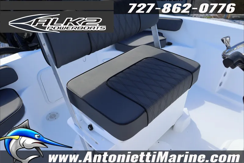 Slide: The Image of 2026 ALK2 Powerboats 18 CRS Center Console seating, featuring sleek black upholstery. - 21