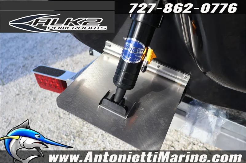 Slide: The Image of 2026 ALK2 Powerboats 18 CRS Center Console trim tab detail with contact information. - 6