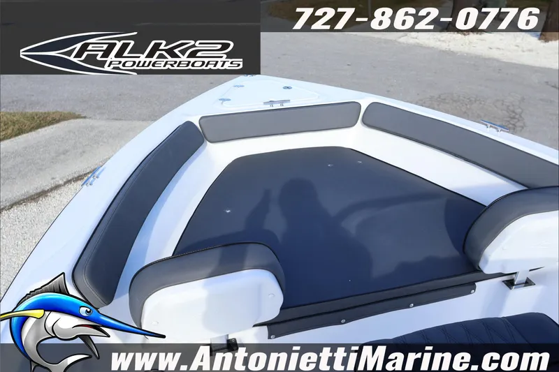 Slide: The Image of 2026 ALK2 Powerboats 18 CRS Center Console with cushioned seating, contact info, and logo. - 8