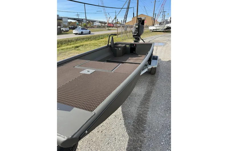 Slide: The Image of 2026 Gator Tail 1748 Gator Series boat on trailer, parked outdoors. - 4