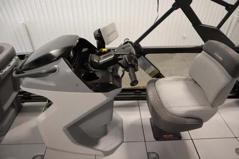 Slide: The Image of 2024 Sea-Doo Switch Cruise 21 cockpit with Garmin navigation and comfortable seating. - 16