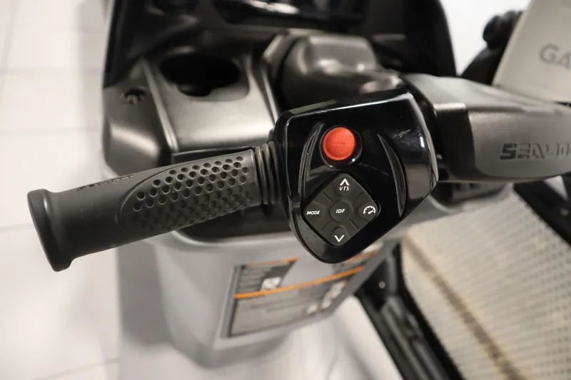 Slide: The Image of 2024 Sea-Doo Switch Cruise 21 handlebar controls with start button and mode settings. - 19