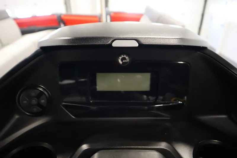 Slide: The Image of 2024 Sea-Doo Switch Cruise 21 dashboard with digital display and controls. - 21
