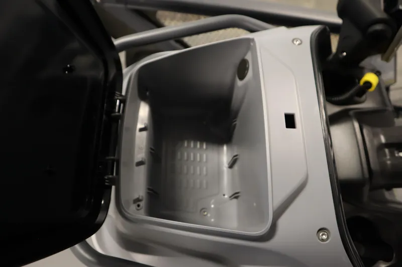 Slide: The Image of Open storage compartment of 2024 Sea-Doo Switch Cruise 21 watercraft. - 22