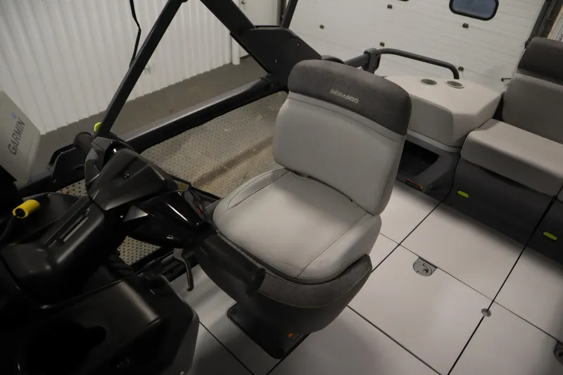 Slide: The Image of 2024 Sea-Doo Switch Cruise 21 interior with seating and control console. - 25