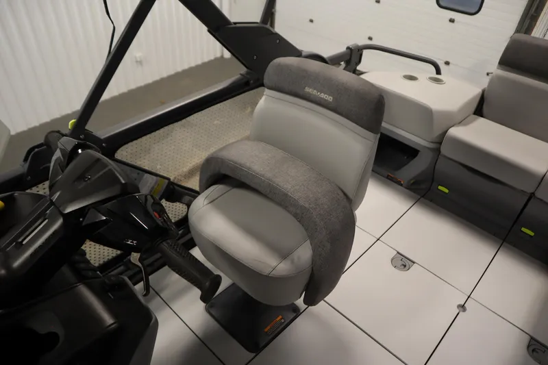 Slide: The Image of 2024 Sea-Doo Switch Cruise 21 interior with steering and seating area. - 26