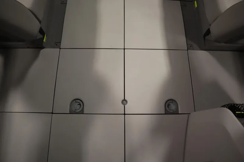 Slide: The Image of 2024 Sea-Doo Switch Cruise 21 interior floor with modular design and storage compartments. - 29