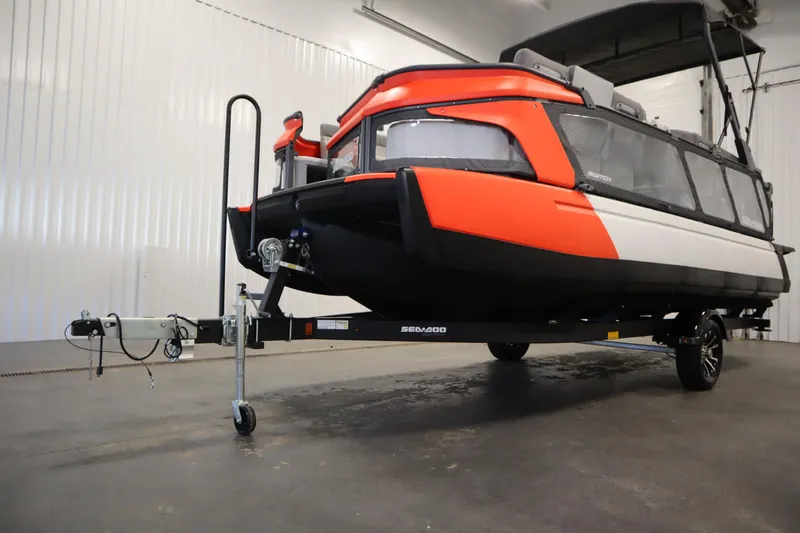 Slide: The Image of 2024 Sea-Doo Switch Cruise 21 on trailer in indoor setting. - 32