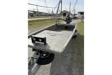 Slide: The Image of 2026 Gator Tail 1754 Extreme boat on trailer, outdoor setting. - 10