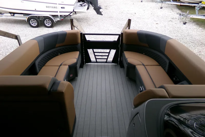 Slide: The Image of 2026 Sylvan L3 DLZ Bar pontoon boat interior with luxurious seating and modern design. - 7