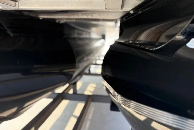 Slide: The Image of Close-up of 2025 Regency 250 DL3 boat hull, showcasing sleek design and craftsmanship. - 20