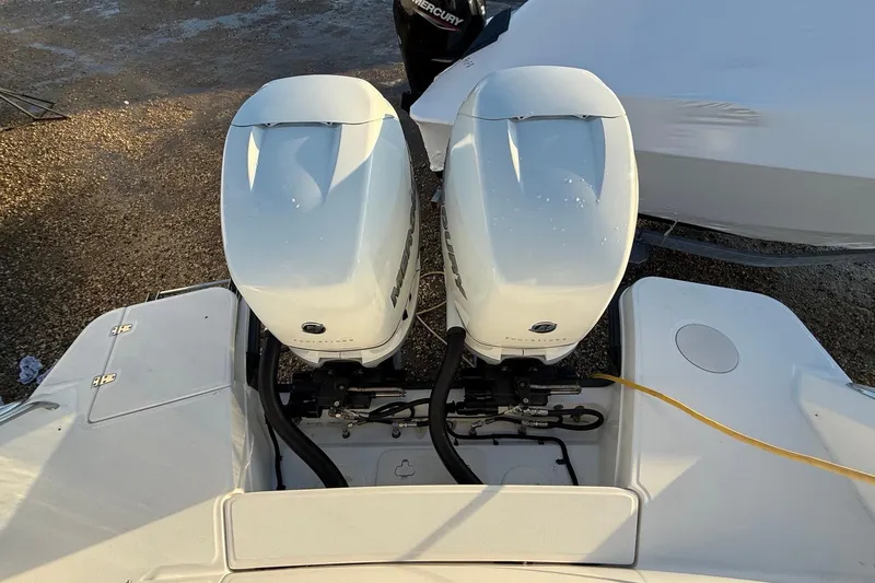 Slide: The Image of 2017 Boston Whaler 320 Vantage with dual Mercury outboard engines, viewed from above. - 11