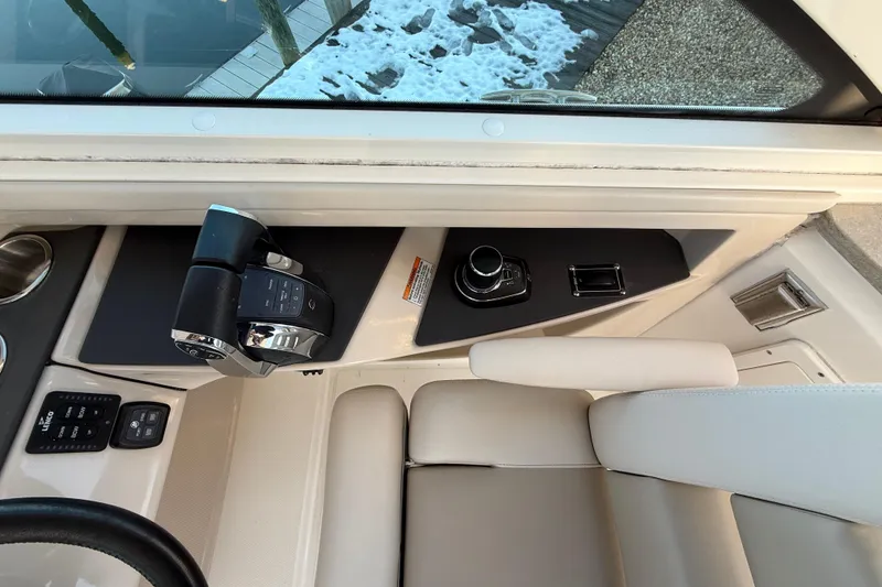 Slide: The Image of 2017 Boston Whaler 320 Vantage helm controls with modern design and ergonomic seating. - 38