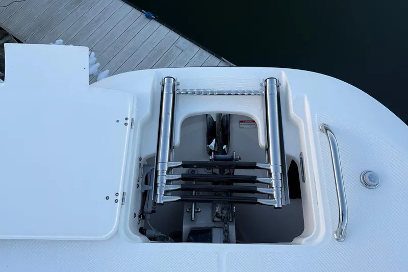 Slide: The Image of 2017 Boston Whaler 320 Vantage boat ladder and hatch detail. - 59