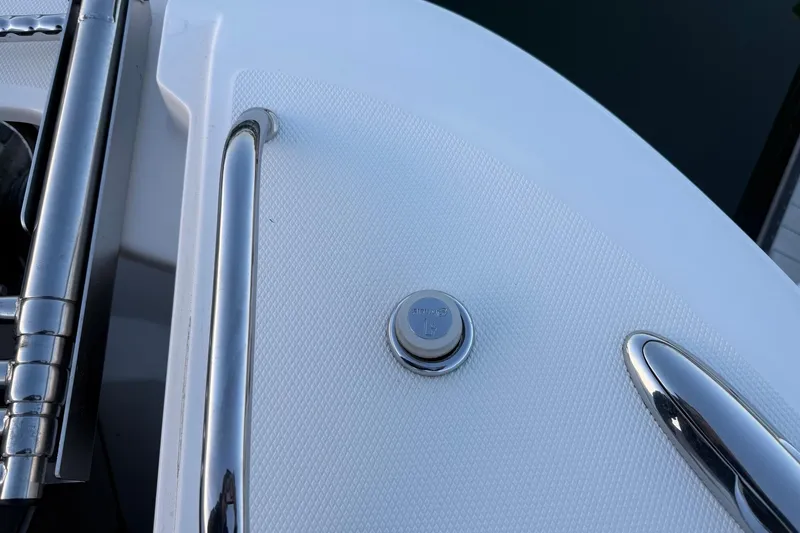 Slide: The Image of 2017 Boston Whaler 320 Vantage boat deck with stainless steel fittings. - 60