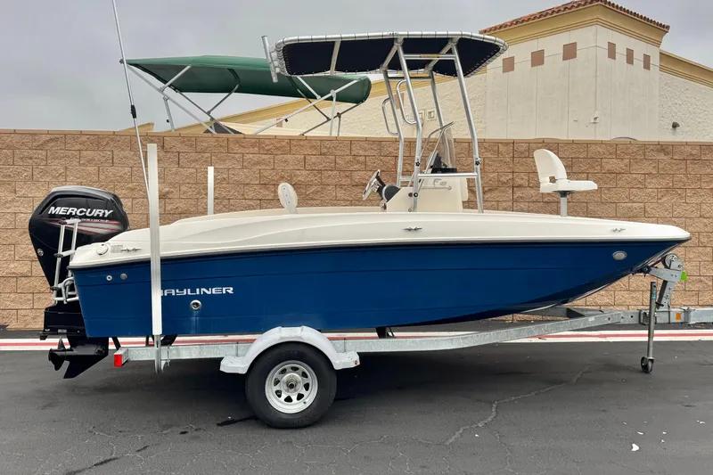 The Image of 2017 Bayliner Element F18 boat on trailer with Mercury outboard motor. - 0