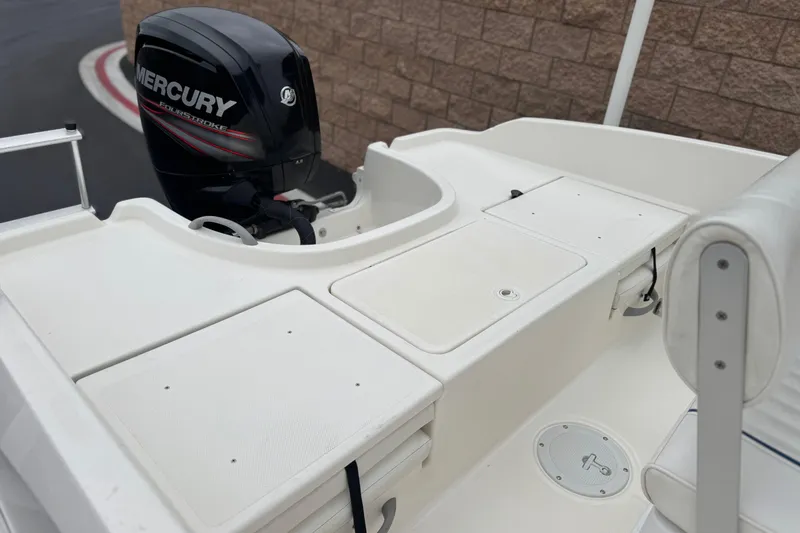 Slide: The Image of 2017 Bayliner Element F18 boat with Mercury FourStroke engine, rear deck view. - 16